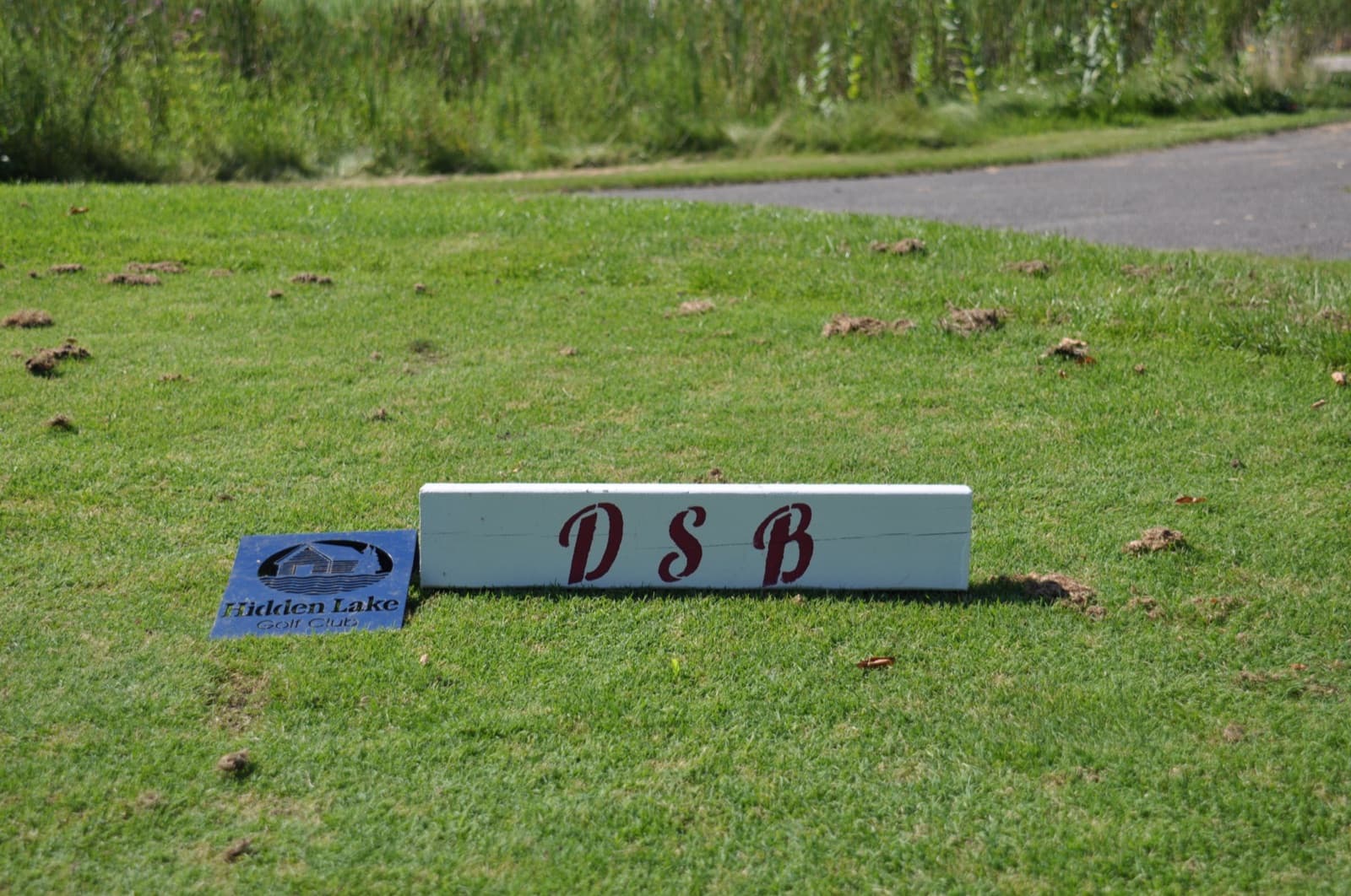 White tee block reading DSB on the tee deck